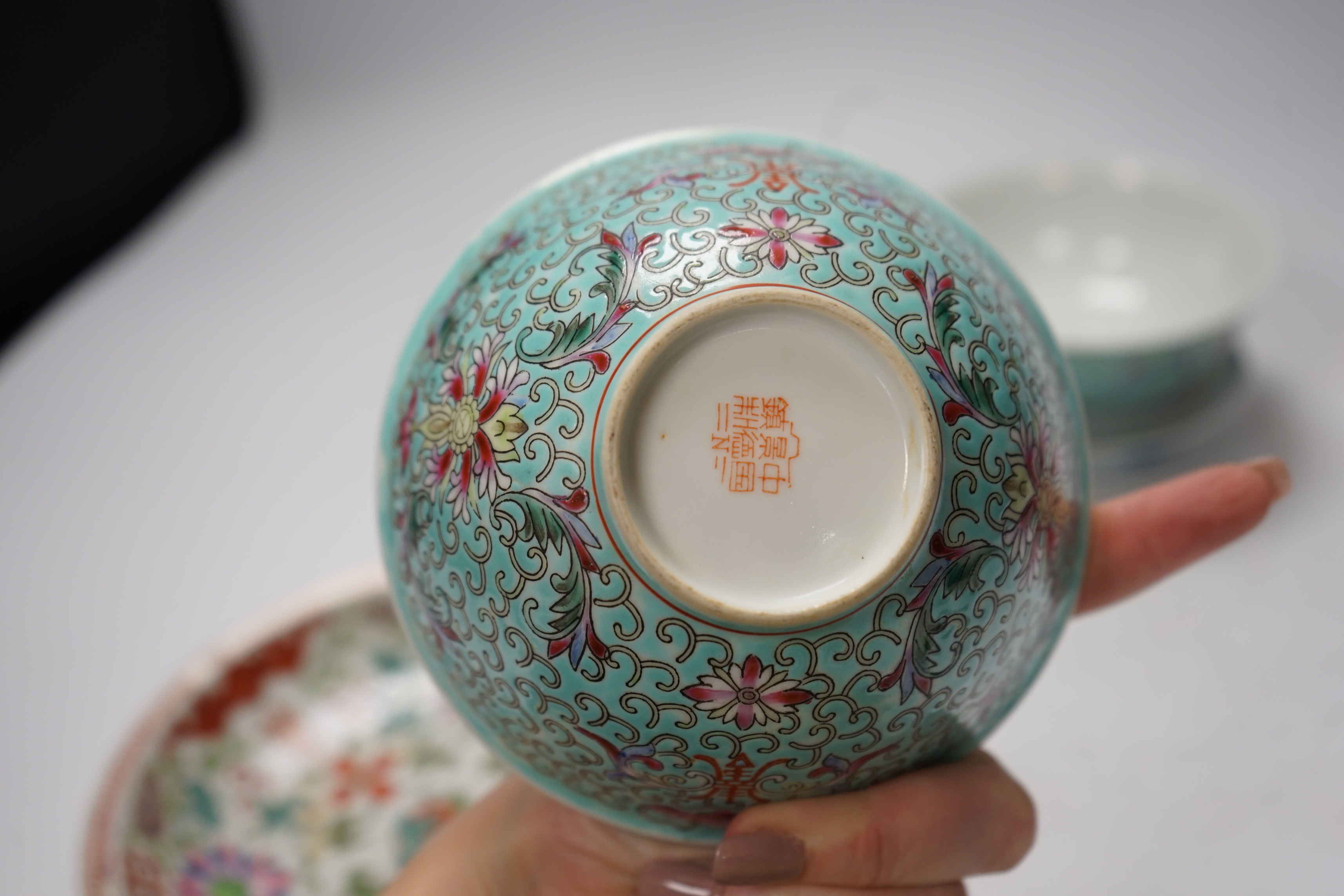 Six Chinese ceramic items; a teapot, two bowls and three small dishes, teapot 10cm